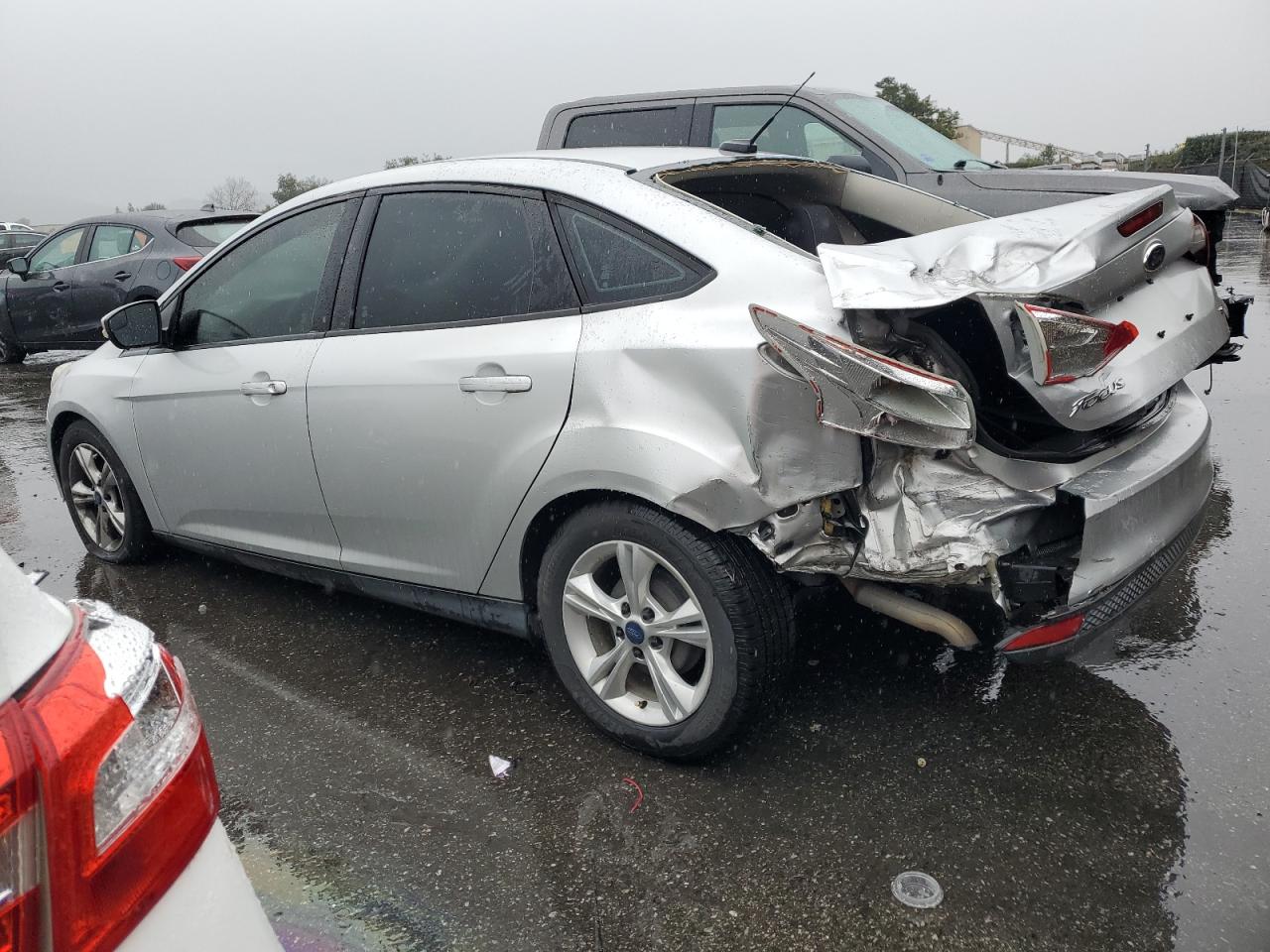 2014 Ford Focus VIN 1FADP3F29EL336393 Copart auction photo, rear end / side damage thumbnail 2