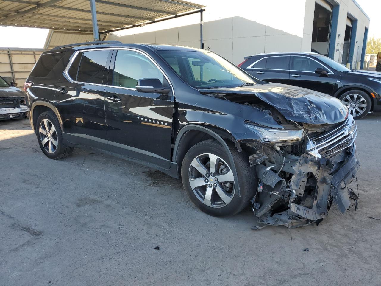 2022 Chevrolet Traverse VIN 1GNERHKW6NJ121880 Copart auction photo, front end / minor dent/scratches damage thumbnail 4