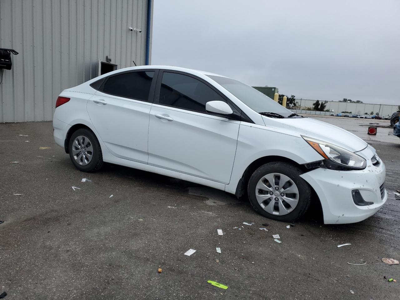 2016 Hyundai Accent VIN KMHCT4AE4GU115298 Copart auction photo, front end / side damage thumbnail 4