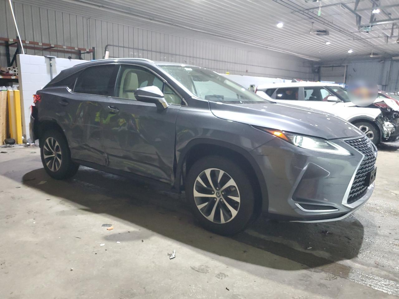 2021 Lexus RX VIN 2T2HZMDA0MC264670 Copart auction photo, side / rear end damage thumbnail 4