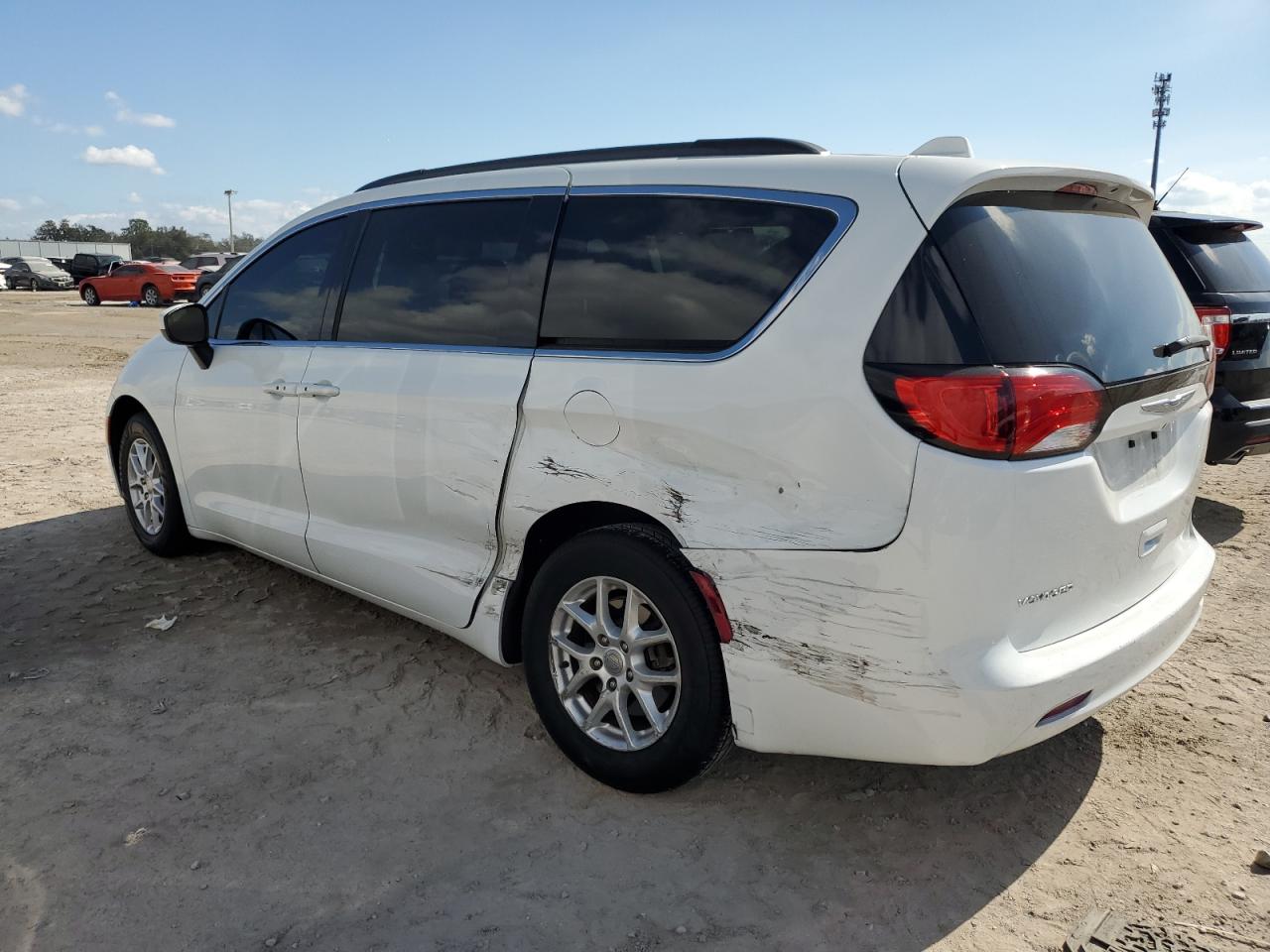 2020 Chrysler Voyager VIN 2C4RC1DG9LR144605 Copart auction photo, side damage thumbnail 2