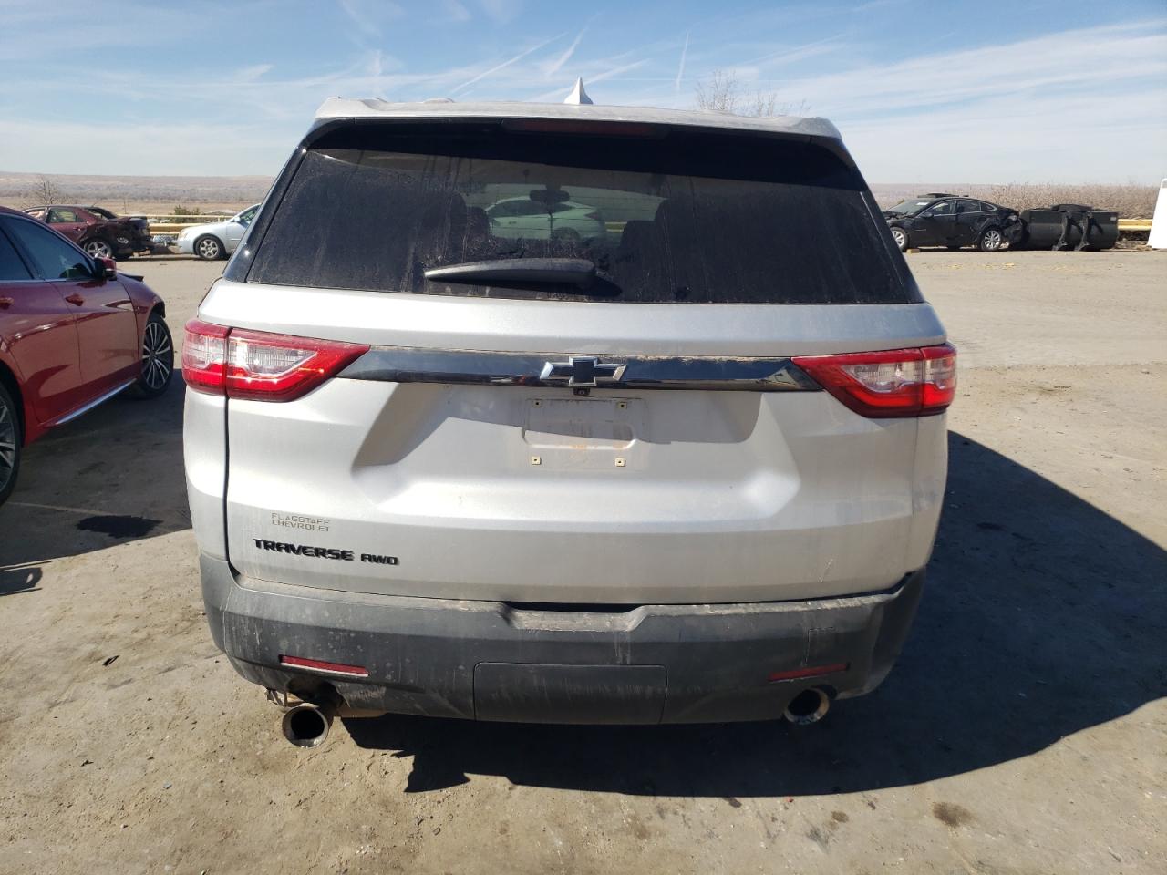 2021 Chevrolet Traverse VIN 1GNEVFKW0MJ230544 Copart auction photo, all over damage thumbnail 6