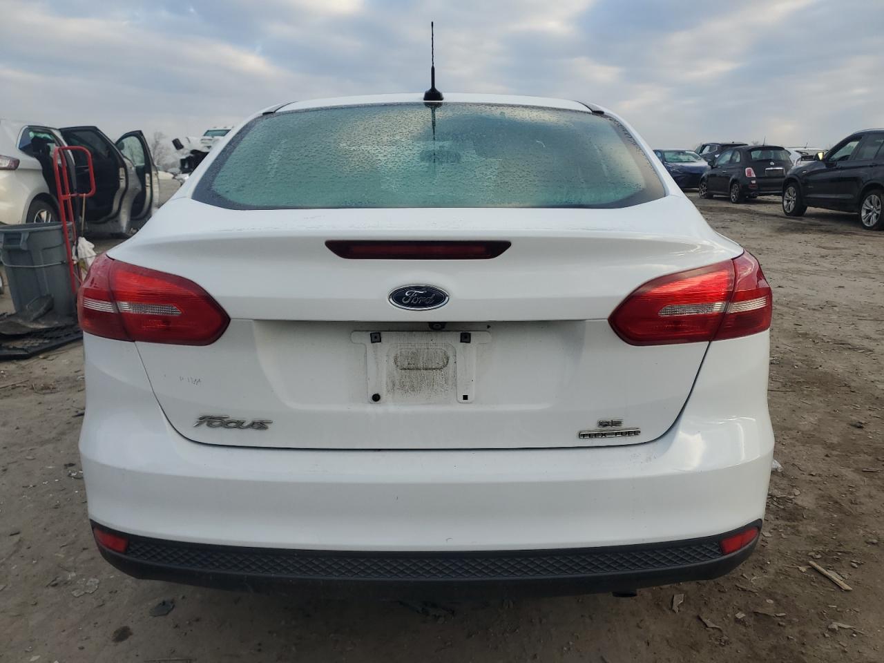2015 Ford Focus VIN 1FADP3F28FL382346 Copart auction photo, front end / minor dent/scratches damage thumbnail 6