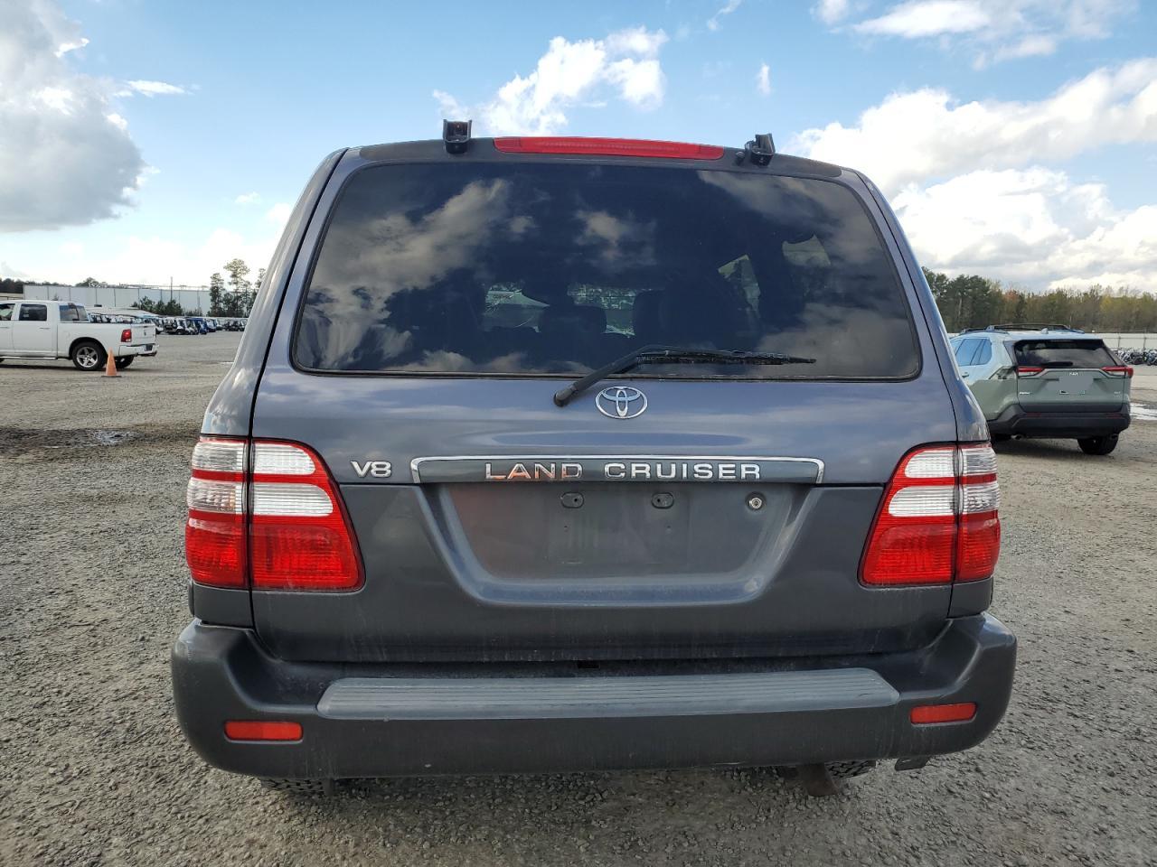 2003 Toyota Land Cruiser VIN JTEHT05J632046741 Copart auction photo, all over damage thumbnail 6