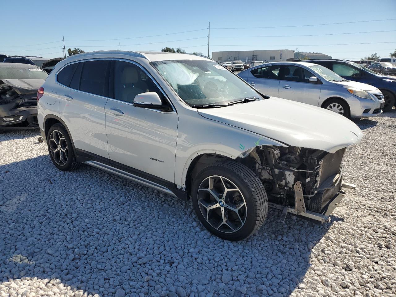 2018 BMW X1 VIN WBXHU7C39J5H45586 Copart auction photo, front end / minor dent/scratches damage thumbnail 4