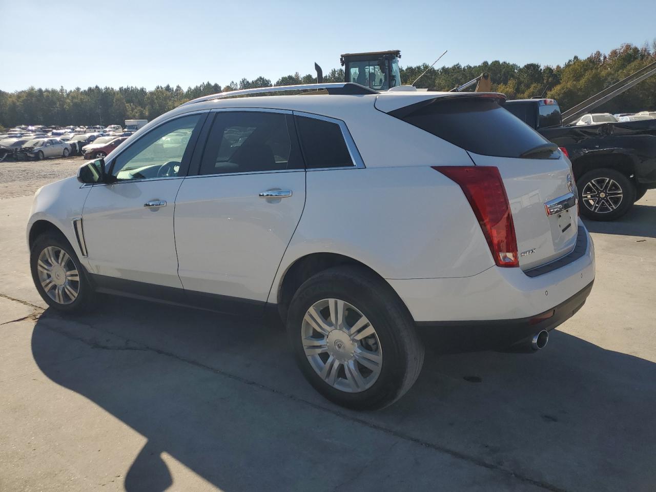 2016 Cadillac SRX VIN 3GYFNBE31GS583881 Copart auction photo, side damage thumbnail 2