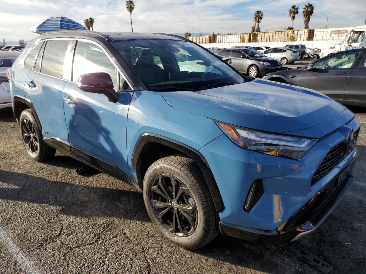 2022 Toyota RAV 4 VIN 4T3E6RFV6NU087353 Copart auction photo, side / minor dent/scratches damage thumbnail 4