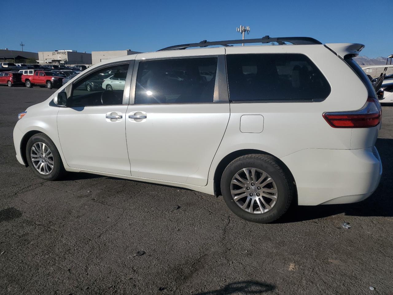 2016 Toyota Sienna VIN 5TDYK3DC7GS747105 Copart auction photo, side / rear end damage thumbnail 2