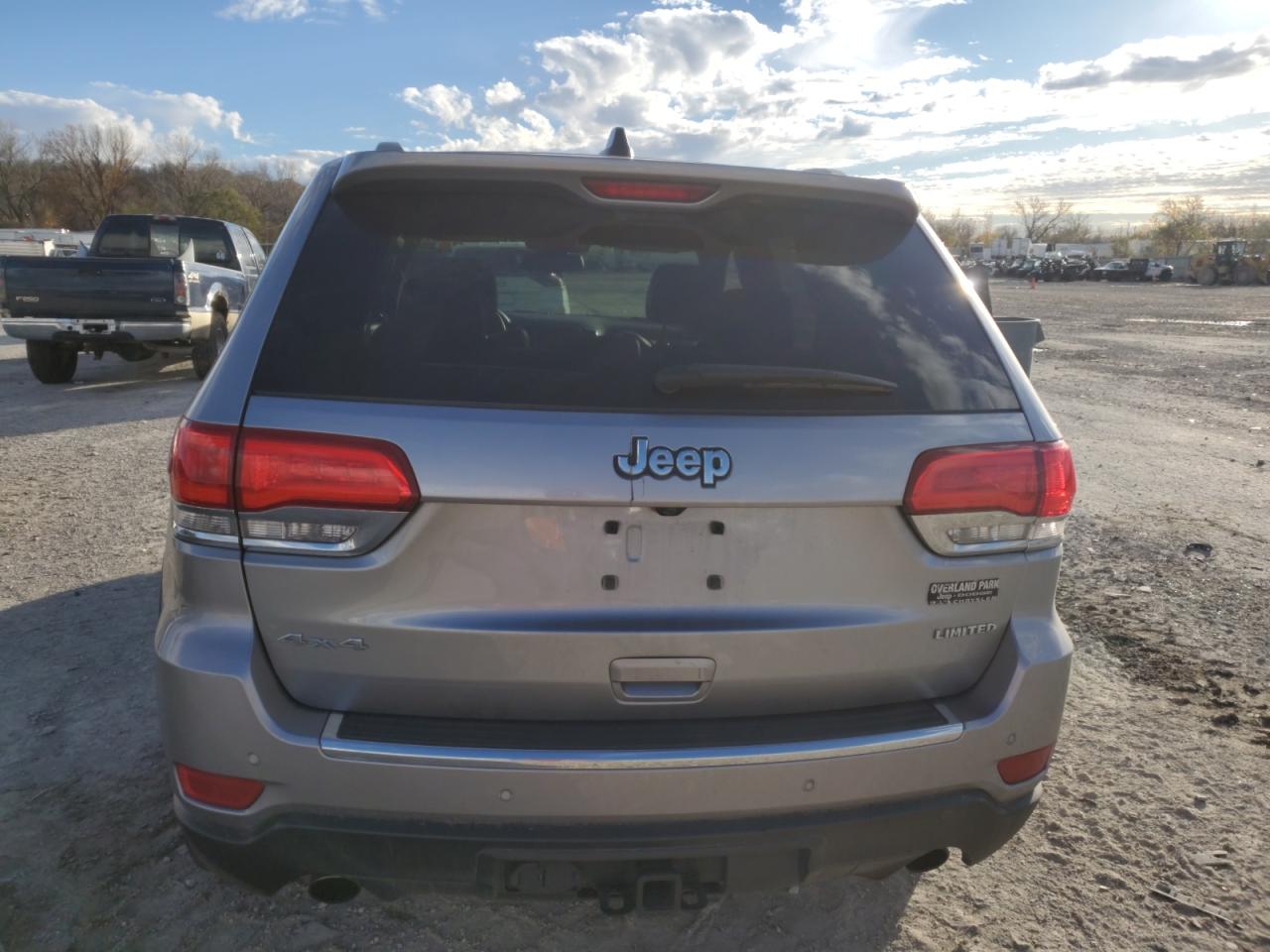 2014 Jeep Grand Cherokee VIN 1C4RJFBT6EC241047 Copart auction photo, front end / side damage thumbnail 6
