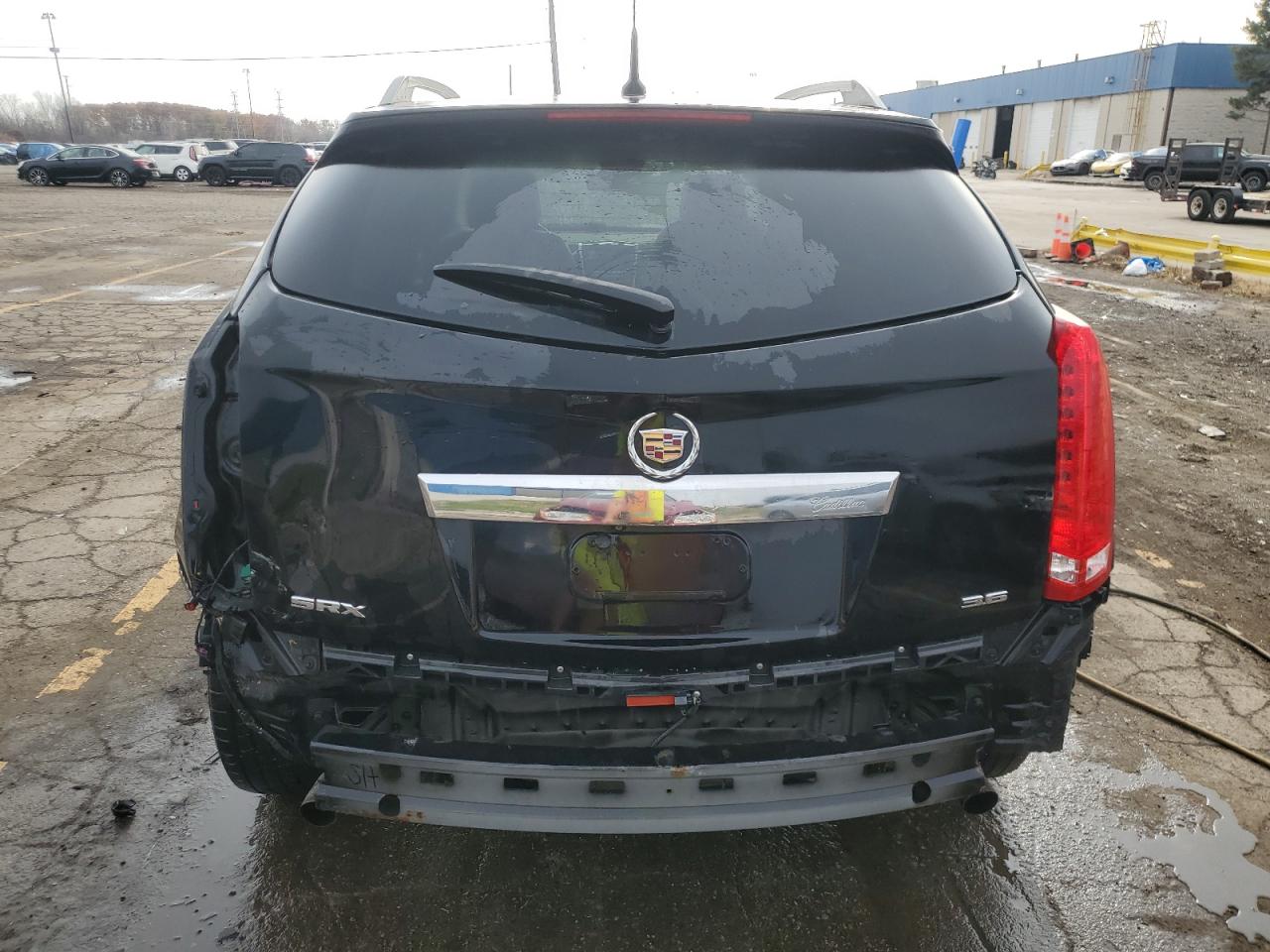2014 Cadillac SRX VIN 3GYFNBE30ES686559 Copart auction photo, rear end damage thumbnail 6