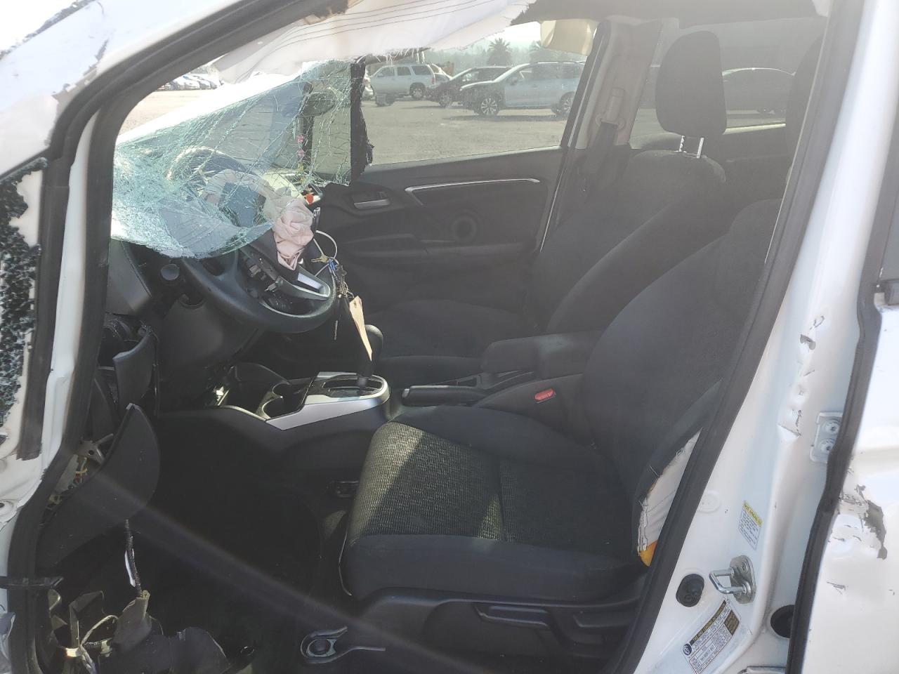 2016 Honda Fit VIN JHMGK5H51GX008405 Copart auction photo, side / front end damage thumbnail 7