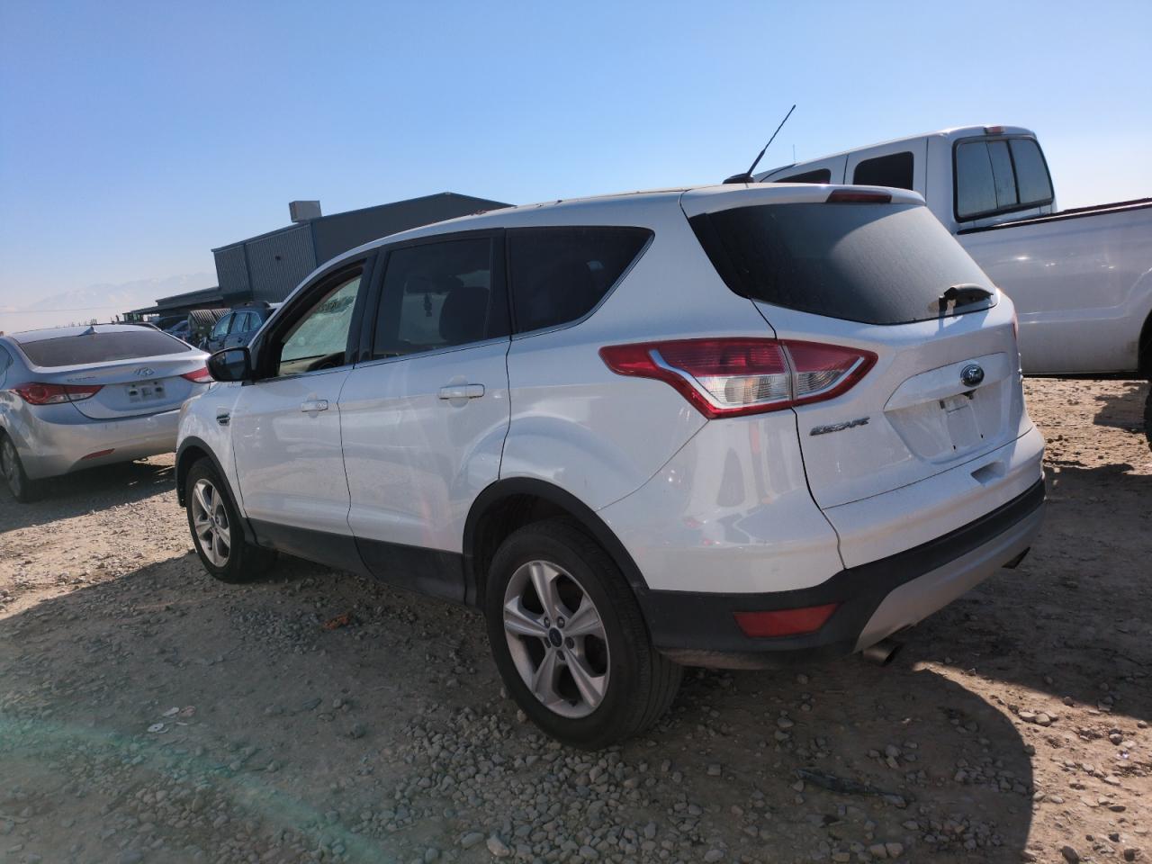 2016 Ford Escape VIN 1FMCU9GX1GUB75610 Copart auction photo, side damage thumbnail 2