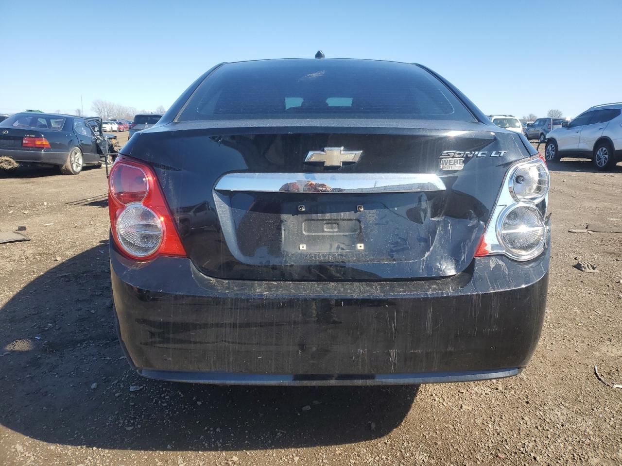 2012 Chevrolet Sonic VIN 1G1JC5SH5C4166290 Copart auction photo, rear end / minor dent/scratches damage thumbnail 6