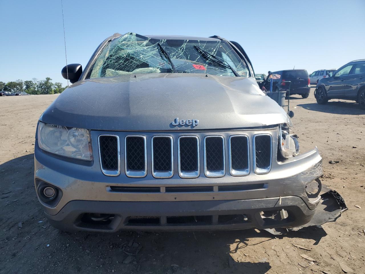 2011 Jeep Compass VIN 1J4NF1FB4BD266694 Copart auction photo, all over damage thumbnail 5