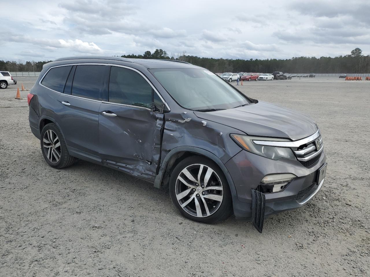 2016 Honda Pilot VIN 5FNYF5H9XGB001654 Copart auction photo, side / rear end damage thumbnail 4