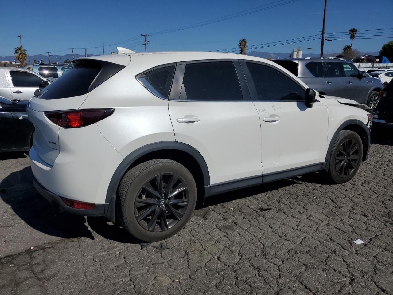 2021 Mazda CX-5 VIN JM3KFABM4M1321480 Copart auction photo, front end / side damage thumbnail 3