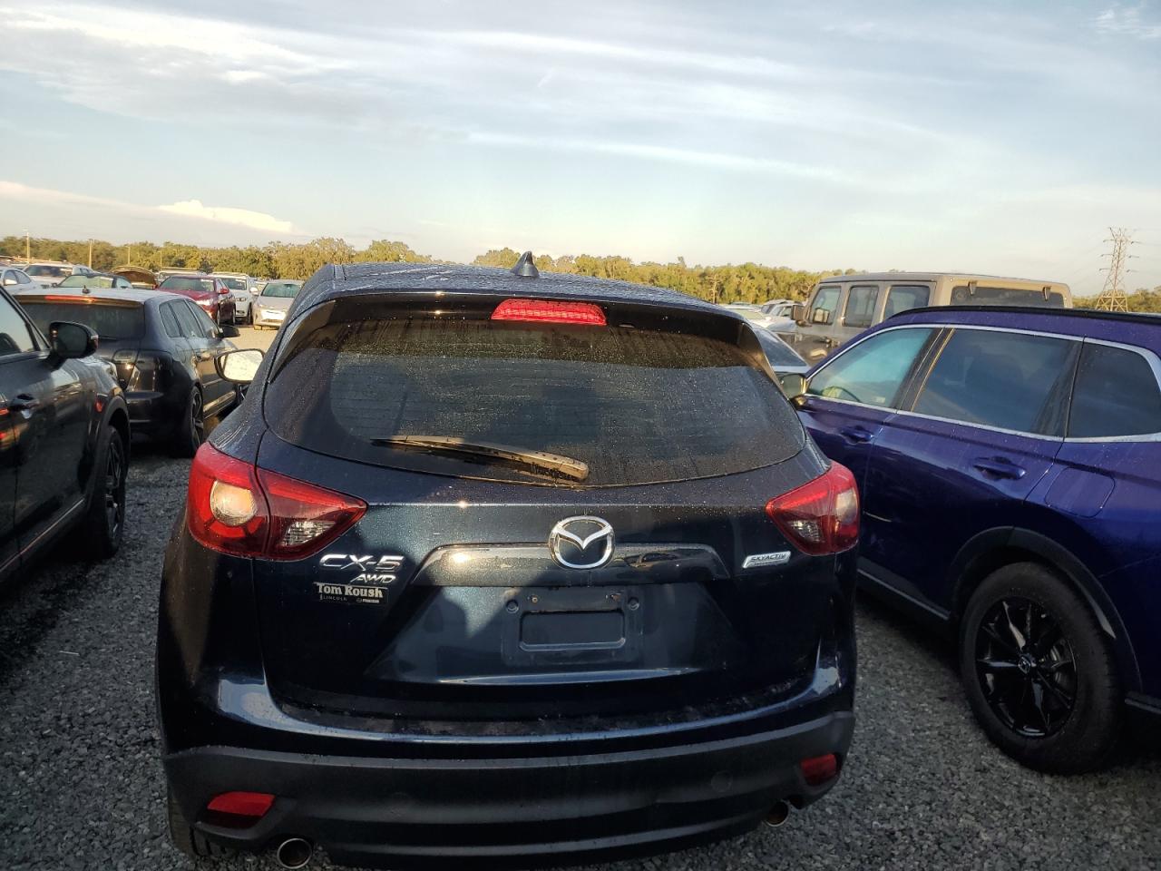 2016 Mazda CX-5 VIN JM3KE4DY3G0856198 Copart auction photo, water/flood damage thumbnail 6