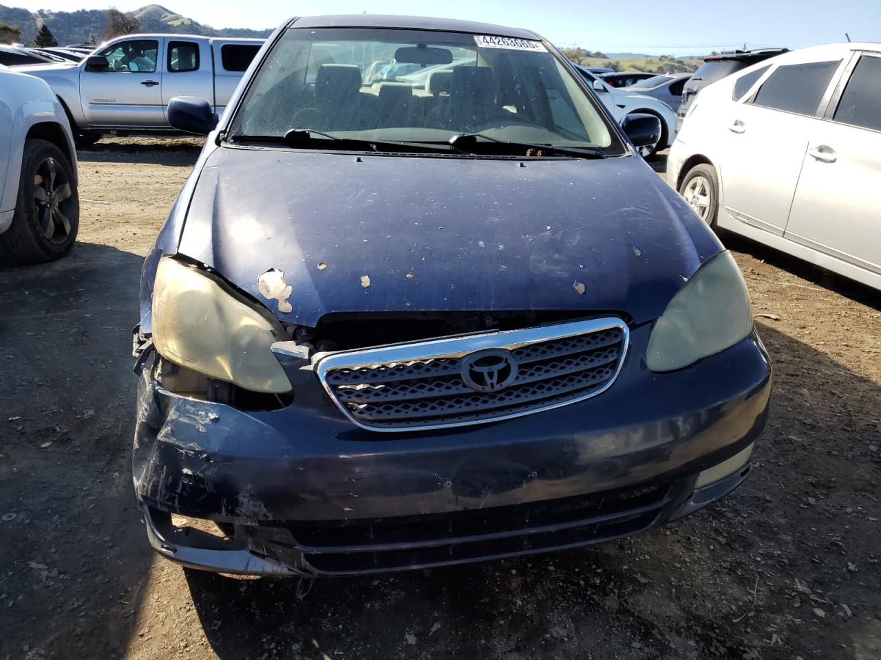 2005 Toyota Corolla VIN 1NXBR32E55Z450165 Copart auction photo, front end / side damage thumbnail 5