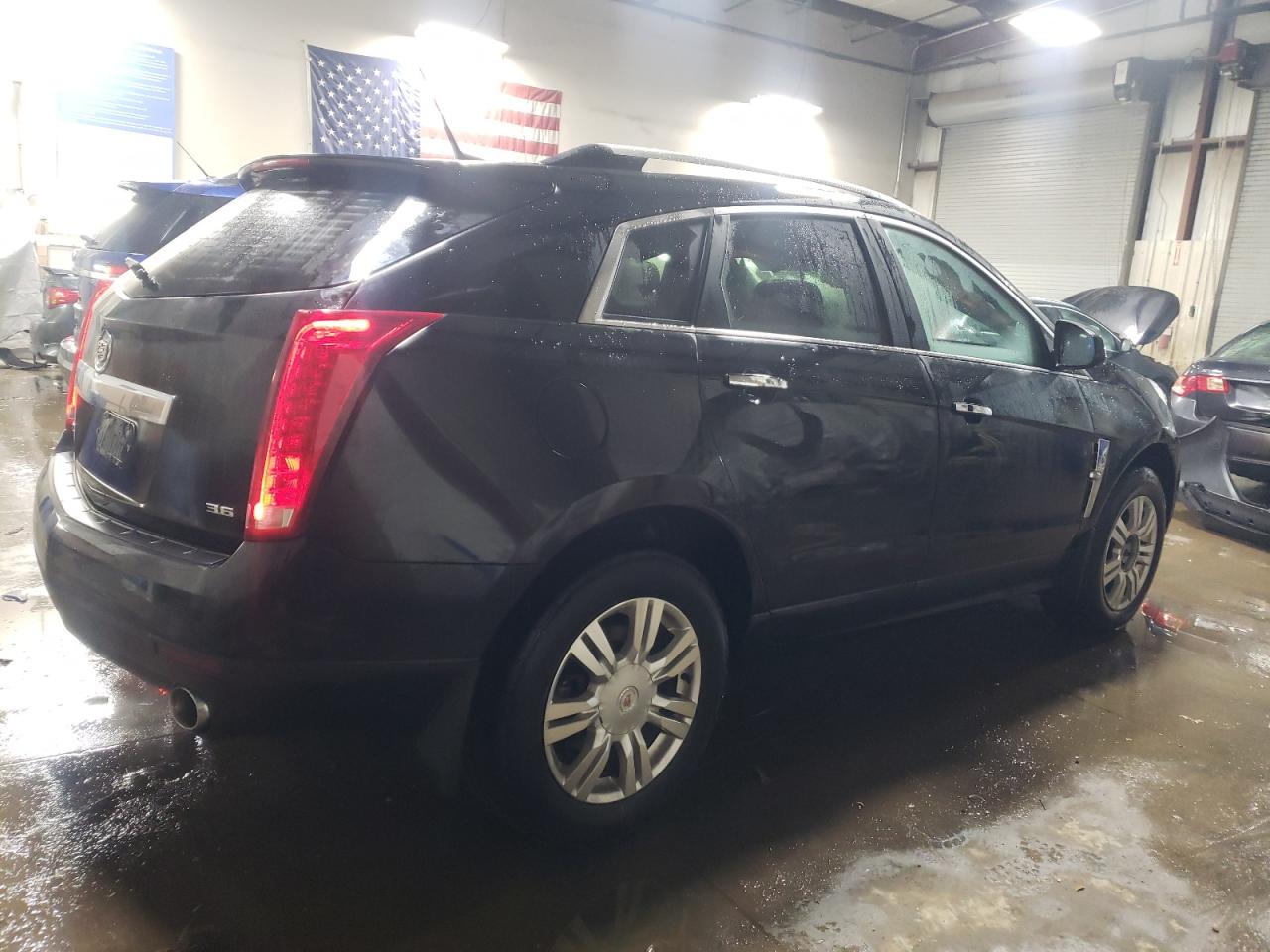 2012 Cadillac SRX VIN 3GYFNAE34CS643379 Copart auction photo, front end / side damage thumbnail 3