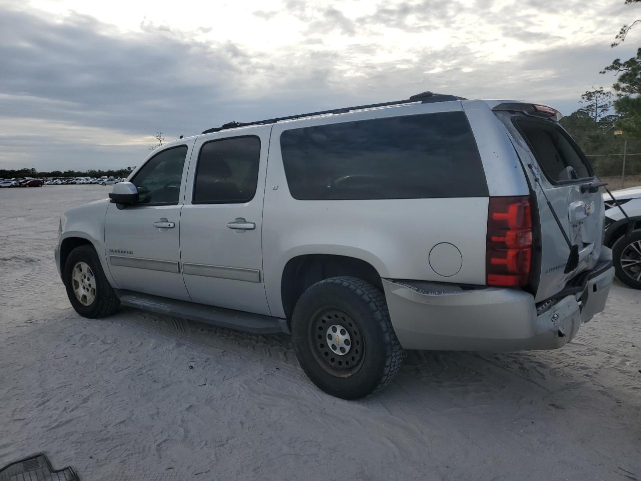 2011 Chevrolet Suburban VIN 1GNSCJE08BR344406 Copart auction photo, rear end / minor dent/scratches damage thumbnail 2