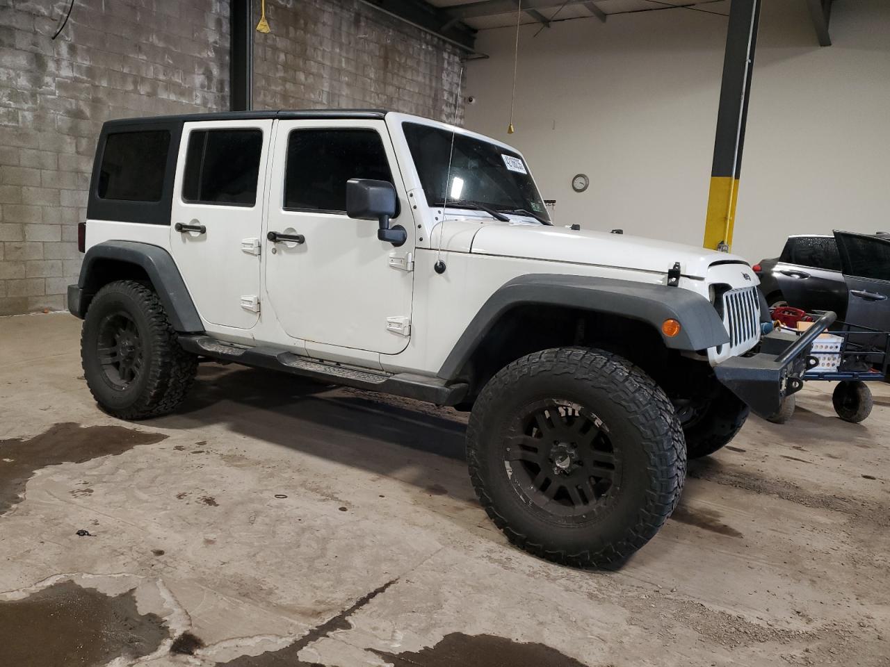 2012 Jeep Wrangler VIN 1C4BJWDGXCL270355 Copart auction photo, side / rear end damage thumbnail 4