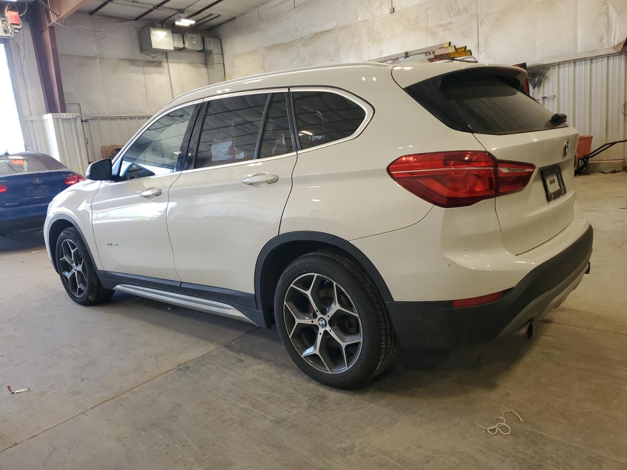 2016 BMW X1 VIN WBXHT3C35GP880408 Copart auction photo, front end damage thumbnail 2
