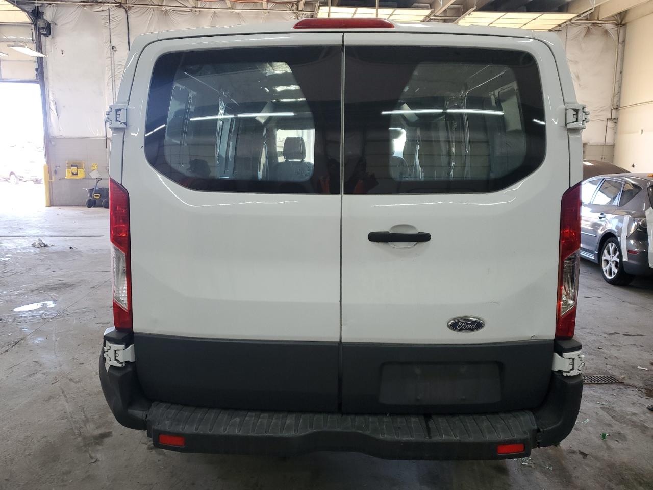 2015 Ford Transit VIN 1FTYR1ZM4FKA99942 Copart auction photo, front end / hail damage thumbnail 6