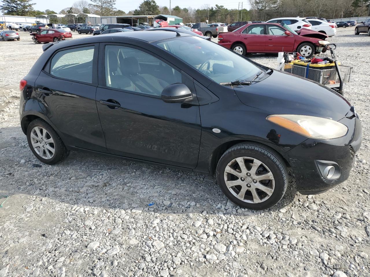 2011 Mazda 2 VIN JM1DE1HYXB0126520 Copart auction photo, side / rear end damage thumbnail 4