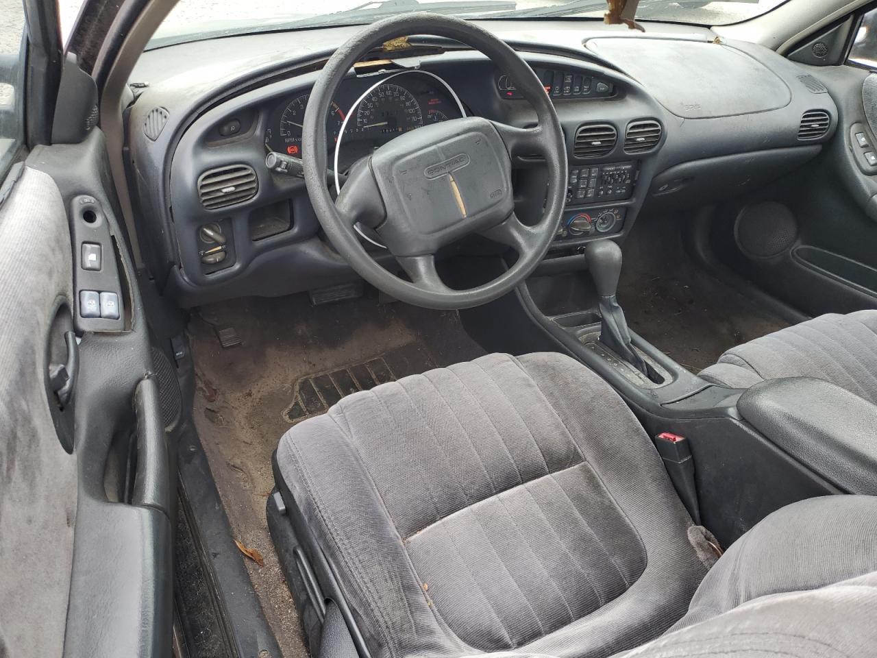 1997 Pontiac Grand Prix VIN 1G2WP12K1VF226163 Copart auction photo, rear end damage thumbnail 8