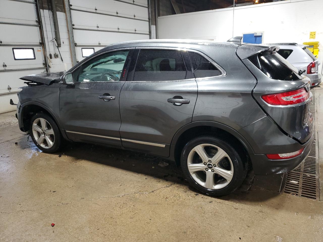2018 Lincoln MKC VIN 5LMCJ1C98JUL04240 Copart auction photo, front end / side damage thumbnail 2