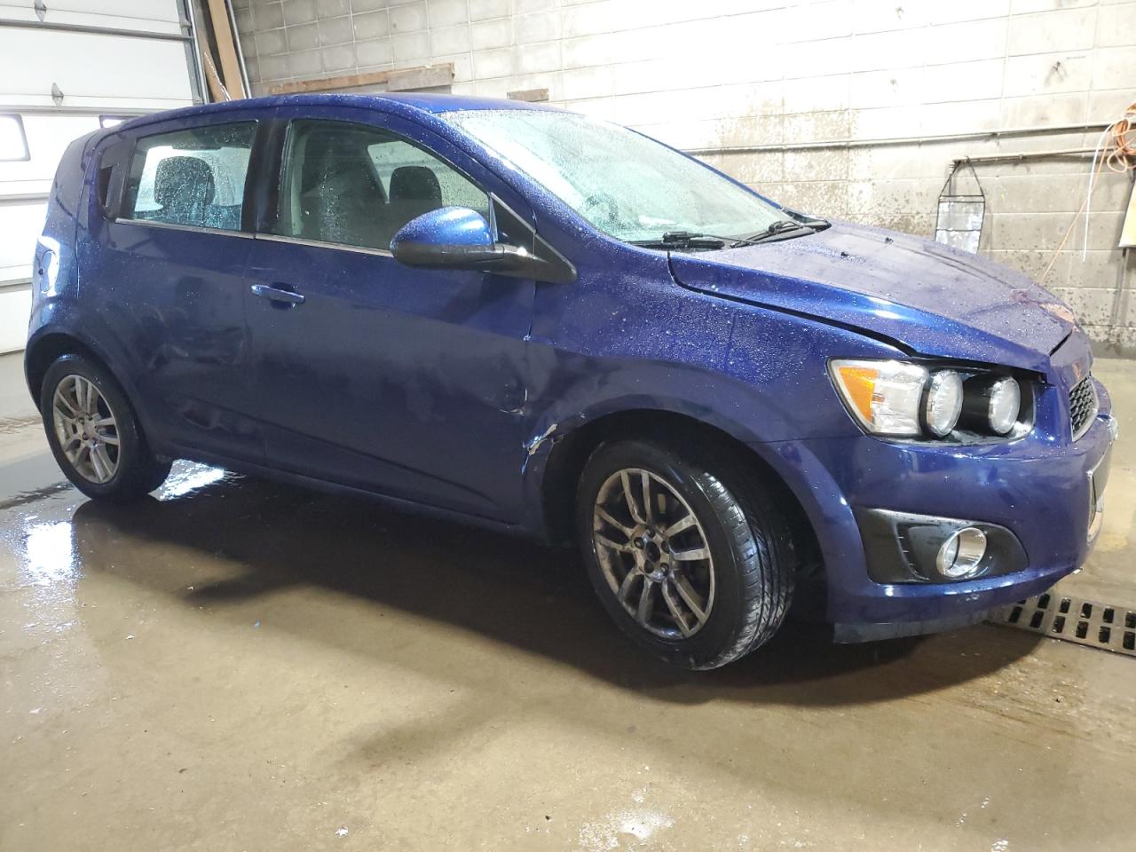 2014 Chevrolet Sonic VIN 1G1JC6SH5E4228778 Copart auction photo, front end / side damage thumbnail 4