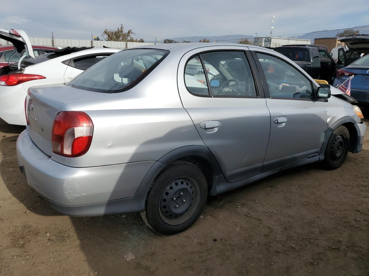 2001 Toyota Echo VIN JTDBT123610155974 Copart auction photo, all over damage thumbnail 3