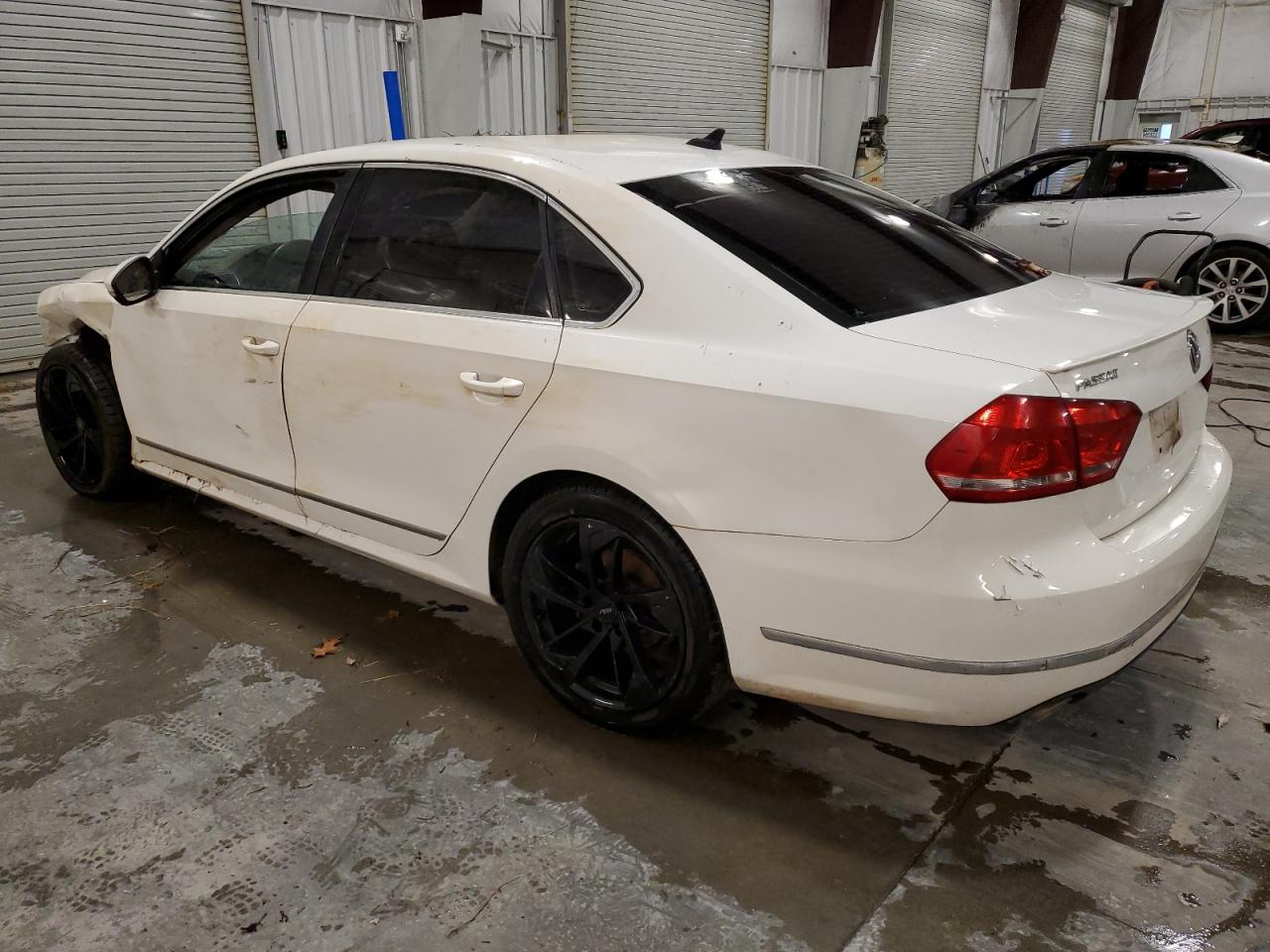 2014 Volkswagen Passat VIN 1VWCN7A34EC067946 Copart auction photo, rollover damage thumbnail 2