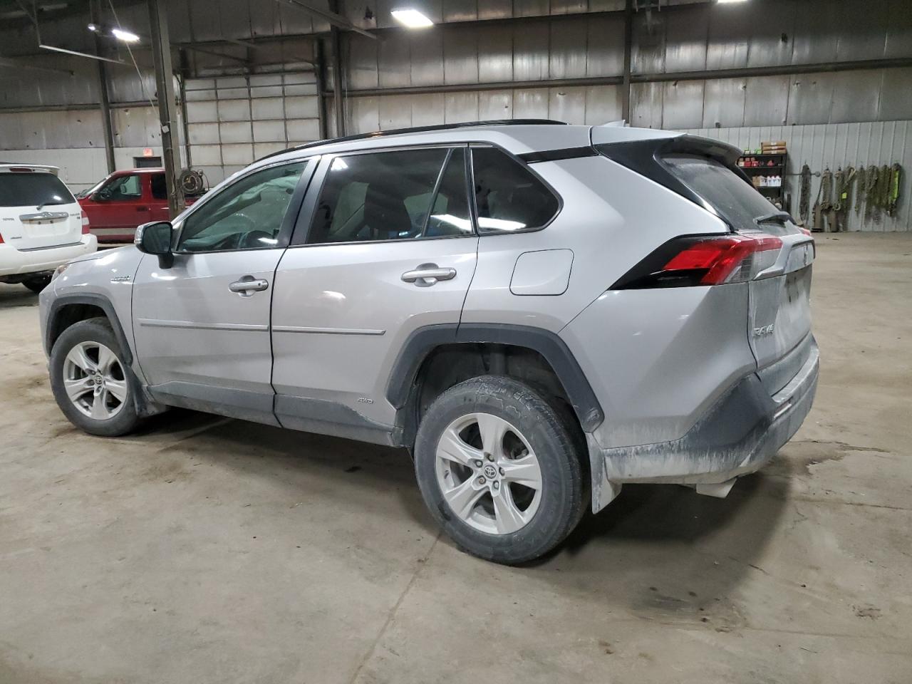 2021 Toyota RAV 4 VIN 4T3R6RFV4MU028687 Copart auction photo, side / undercarriage damage thumbnail 2