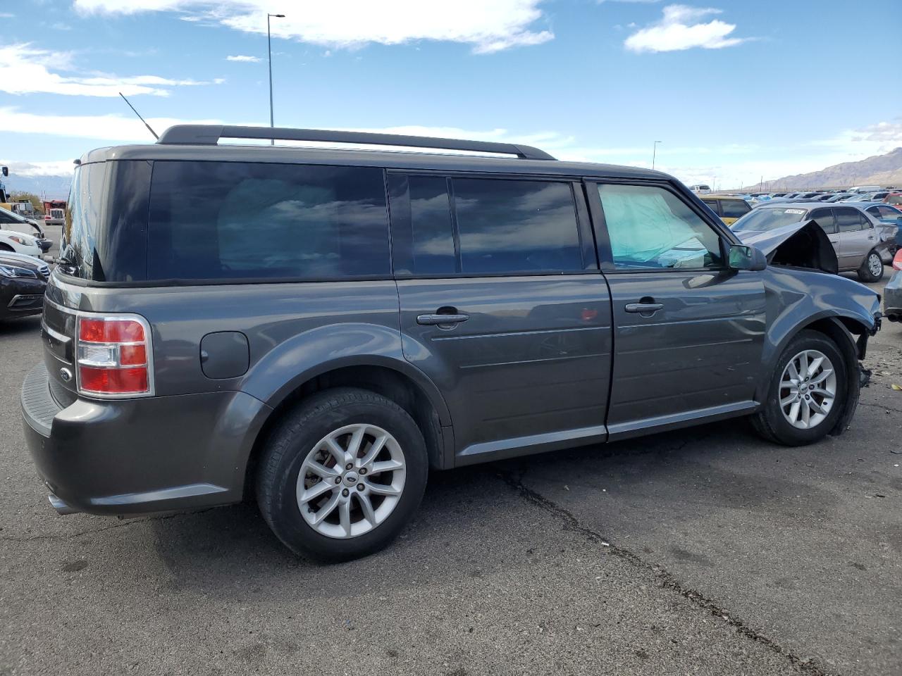 2016 Ford Flex VIN 2FMGK5B8XGBA10807 Copart auction photo, all over damage thumbnail 3