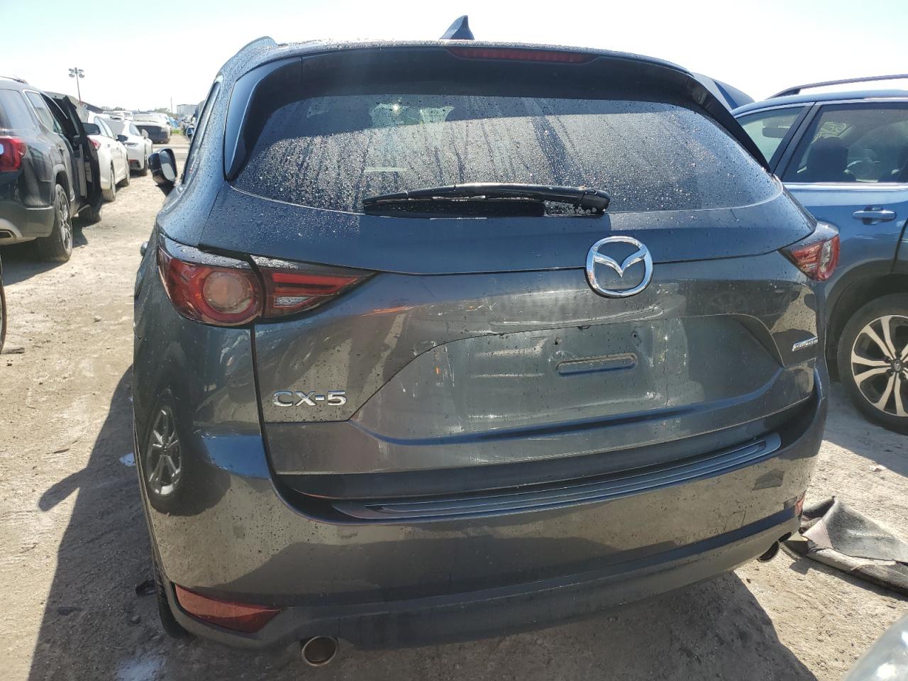 2020 Mazda CX-5 VIN JM3KFADM3L0826587 Copart auction photo, water/flood damage thumbnail 6