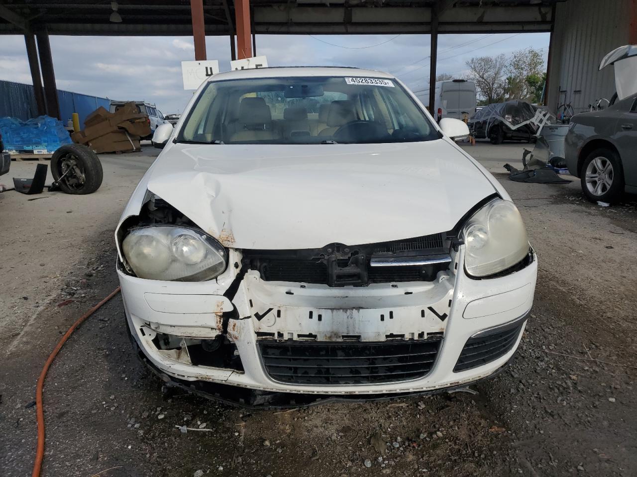 2009 Volkswagen Jetta VIN 3VWRM71K09M090083 Copart auction photo, front end damage thumbnail 5