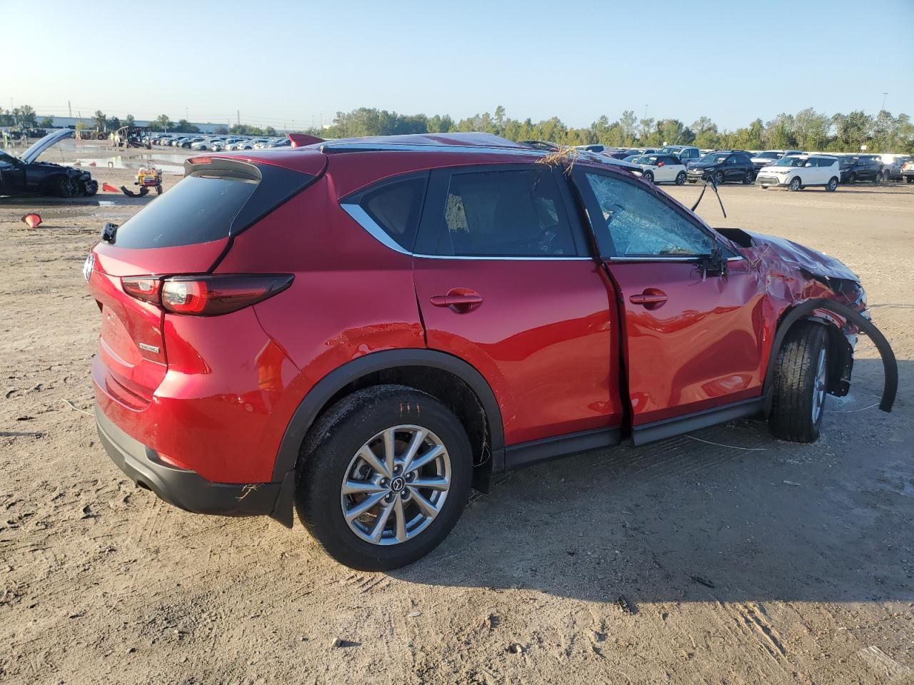 2022 Mazda CX-5 VIN JM3KFBCMXN1547688 Copart auction photo, all over damage thumbnail 3