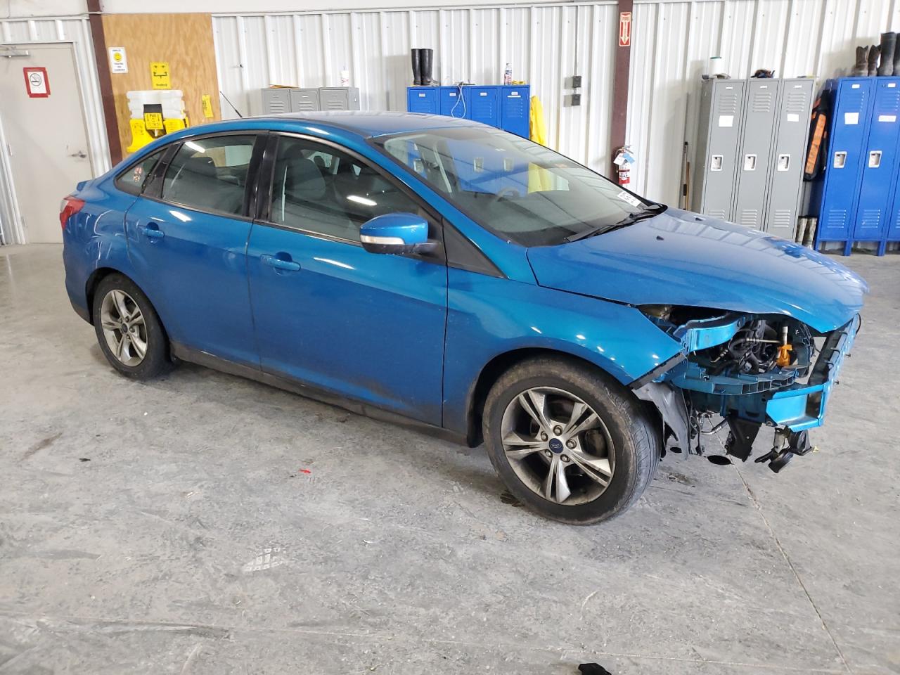 2014 Ford Focus VIN 1FADP3F29EL175589 Copart auction photo, undercarriage / front end damage thumbnail 4