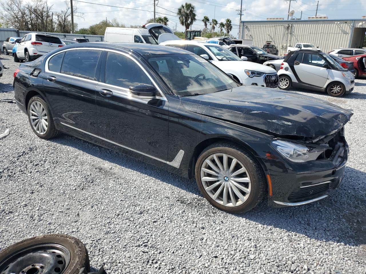 2019 BMW 7er VIN WBA7E2C38KB454843 Copart auction photo, front end / rear end damage thumbnail 4