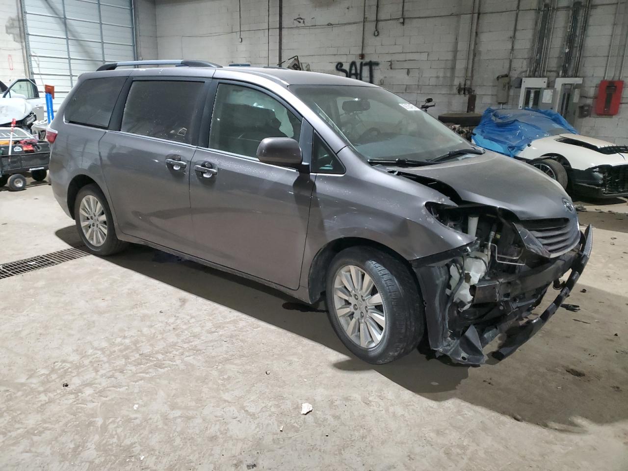 2015 Toyota Sienna VIN 5TDJK3DC0FS110475 Copart auction photo, front end damage thumbnail 4