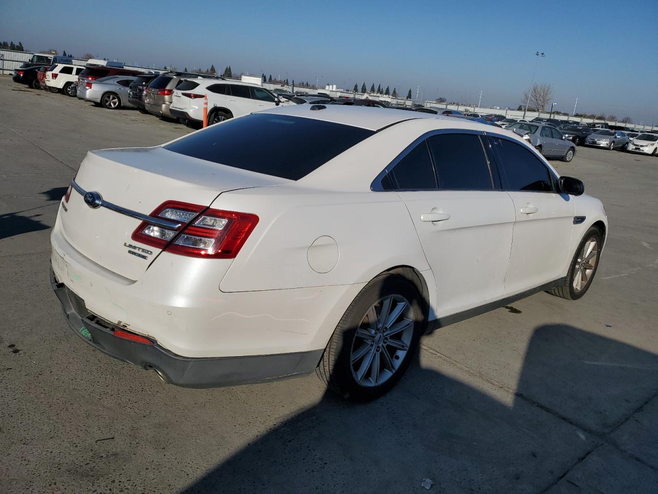 2014 Ford Taurus VIN 1FAHP2F82EG138490 Copart auction photo, side / rear end damage thumbnail 3