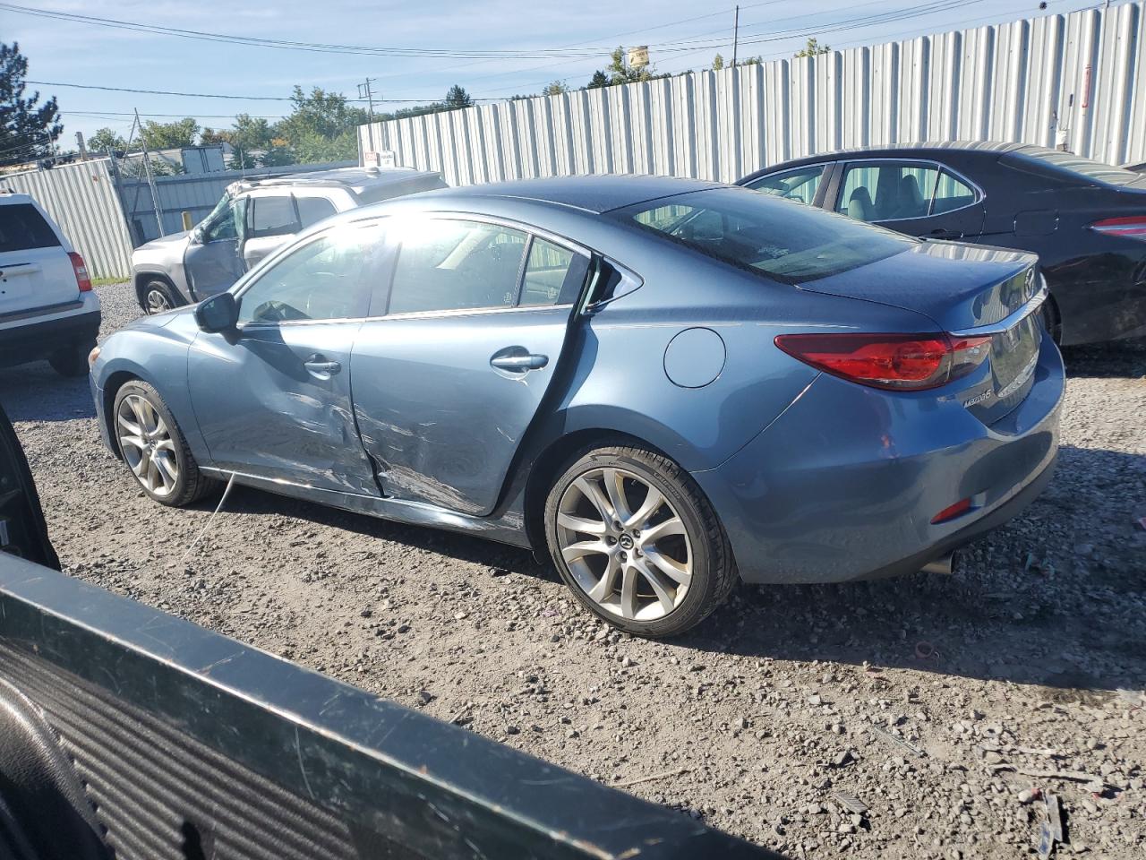 2017 Mazda 6 VIN JM1GL1V54H1147217 Copart auction photo, side damage thumbnail 2