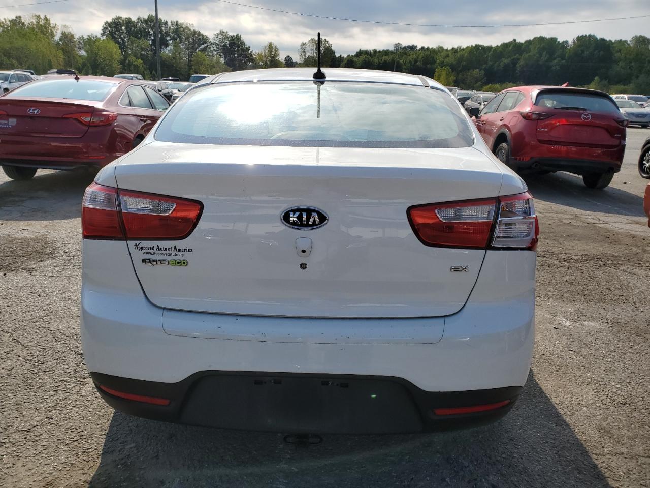 2013 KIA Rio VIN KNADN4A34D6133864 Copart auction photo, front end / vandalism damage thumbnail 6