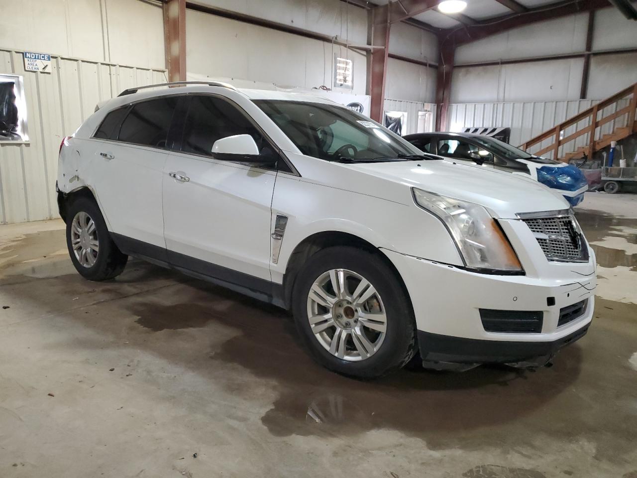 2012 Cadillac SRX VIN 3GYFNAE30CS544381 Copart auction photo, rear end / front end damage thumbnail 4