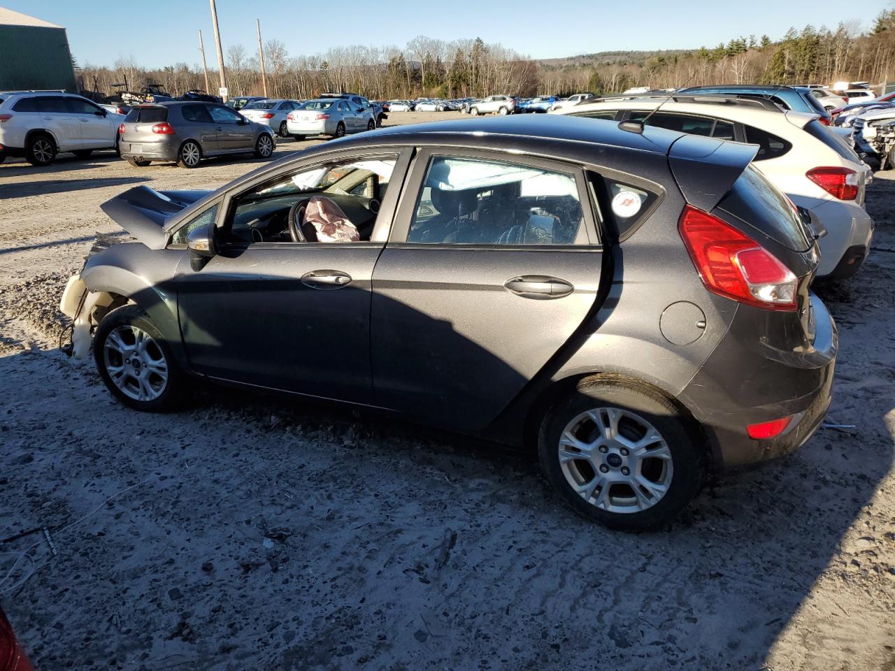 2015 Ford Fiesta VIN 3FADP4EJXFM208386 Copart auction photo, front end / side damage thumbnail 2