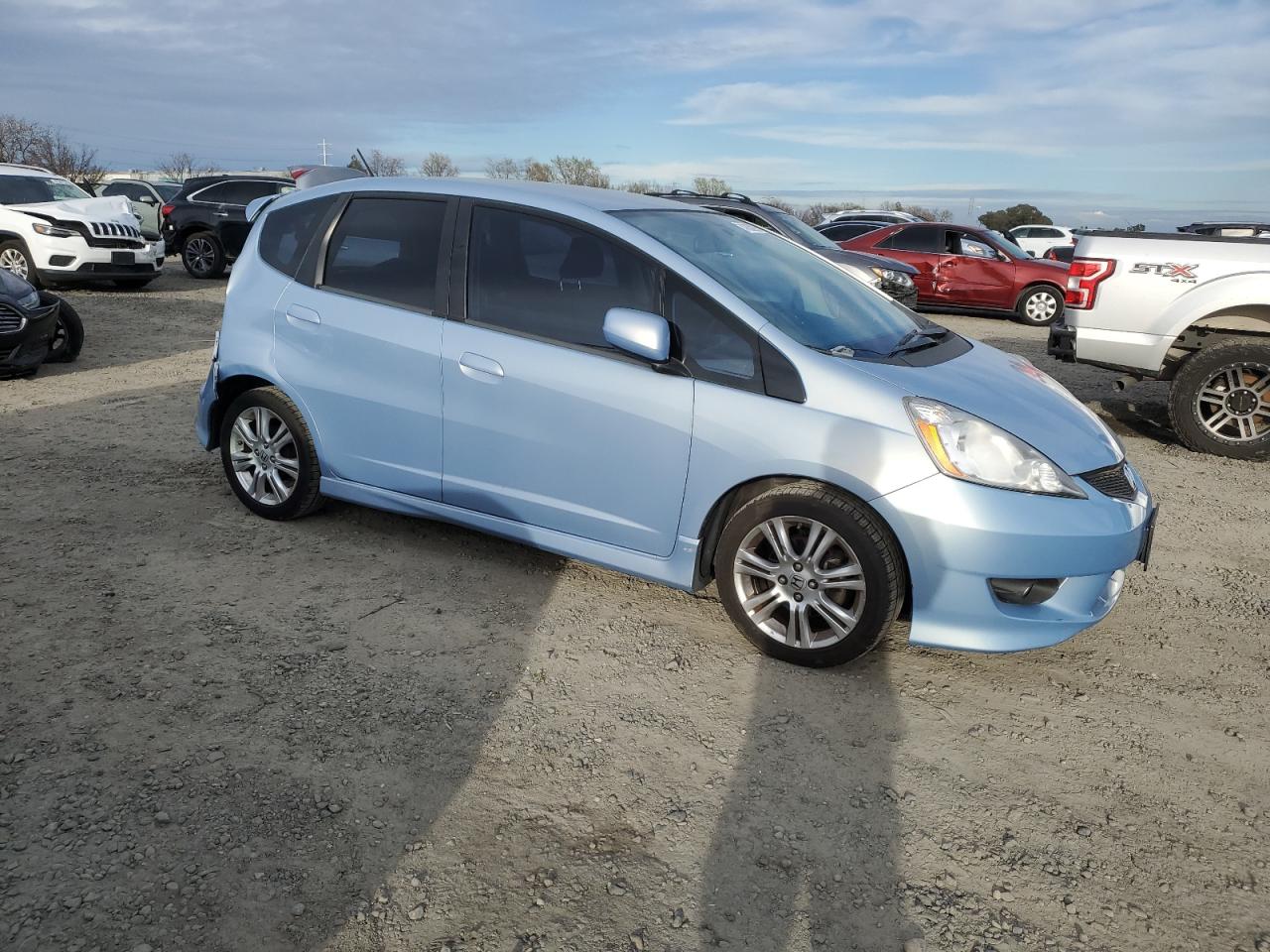 2009 Honda Fit VIN JHMGE88459S044470 Copart auction photo, rear end / side damage thumbnail 4