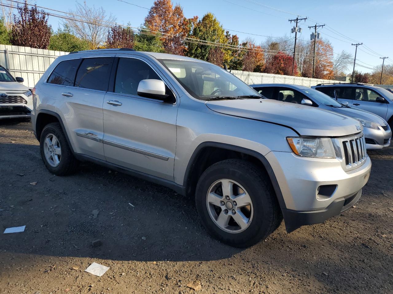 2011 Jeep Grand Cherokee VIN 1J4RR4GG7BC555630 Copart auction photo, side / minor dent/scratches damage thumbnail 4