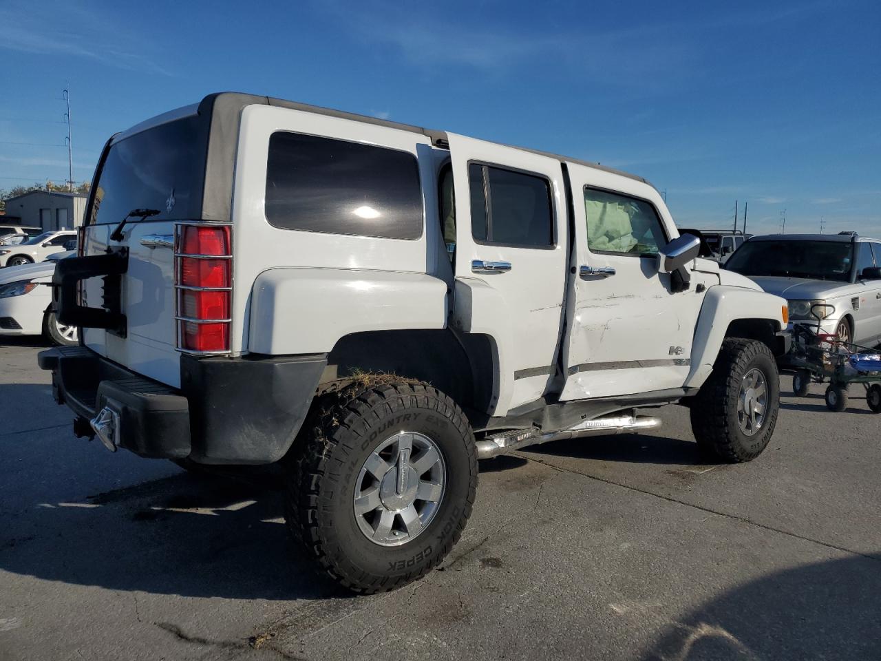 2010 Hummer H3 VIN 5GTMNGEE0A8119047 Copart auction photo, side damage thumbnail 3