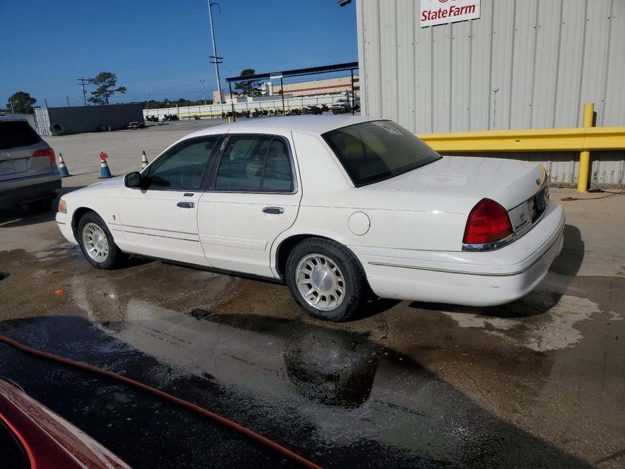 1999 Ford Crown Victoria VIN 2FAFP74W1XX224750 Copart auction photo, front end damage thumbnail 2